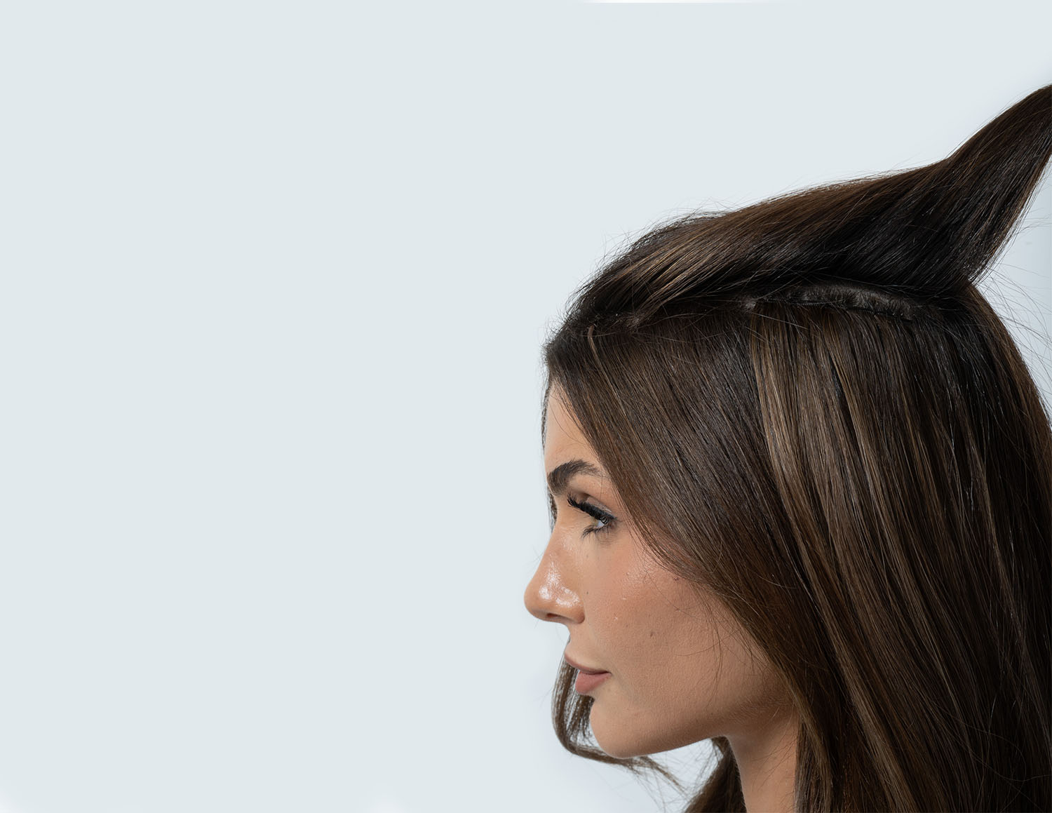 model wearing tape hair extensions from Jadore Hair supplies