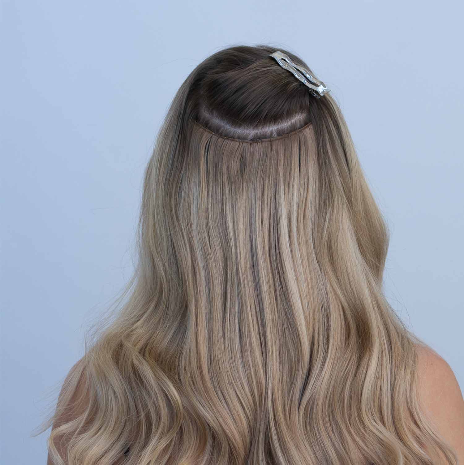 miracle weft installed on model from Jadore Hair Supplies