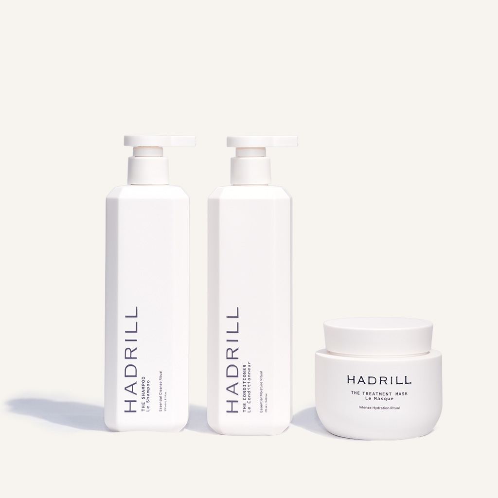 Hadrill Hair Care The Shampoo, The Conditioner and The Treatment Mask in white bottles and jar
